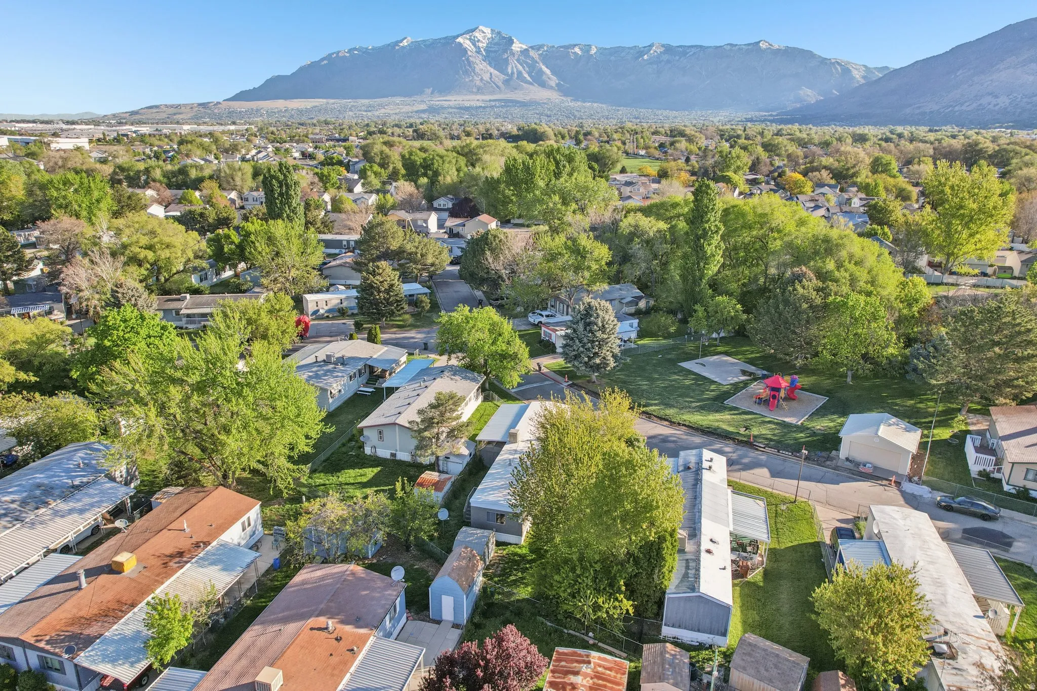 Aerial perspective of suburban area with mountains
