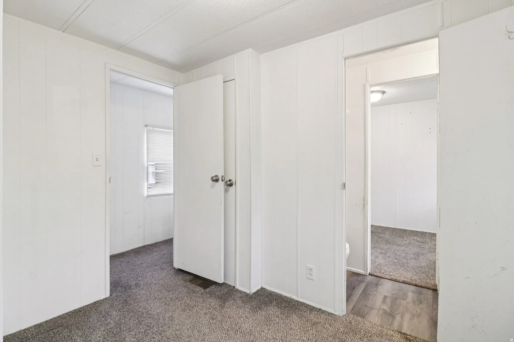 Unfurnished bedroom featuring carpet