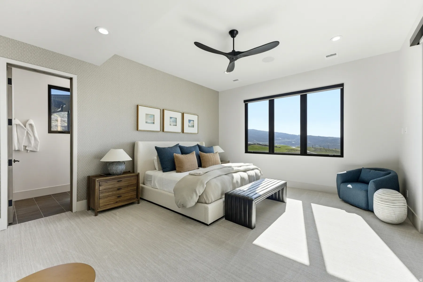 Bedroom with ceiling fan and recessed lighting