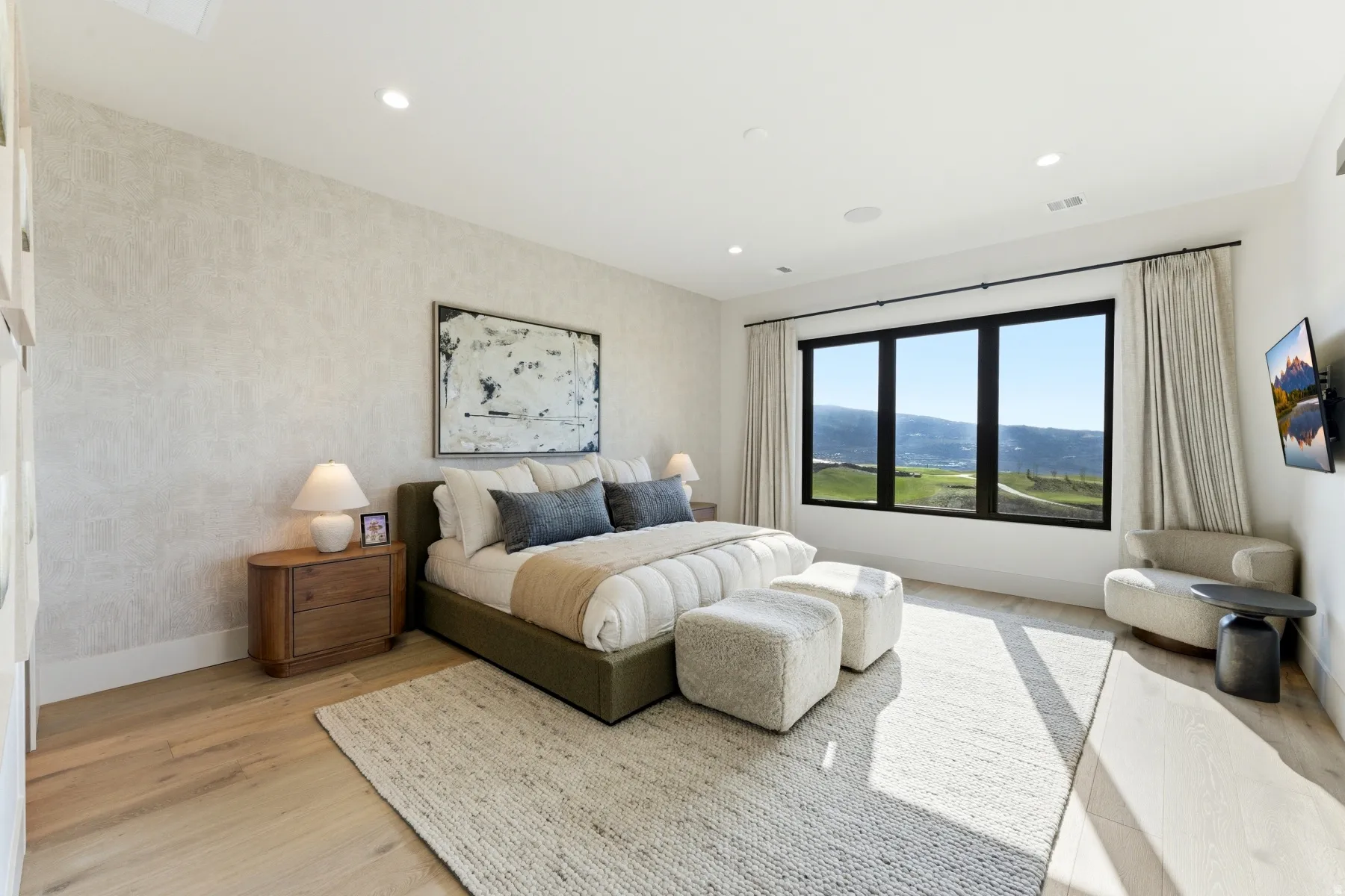 Bedroom with light wood-type flooring and recessed lighting