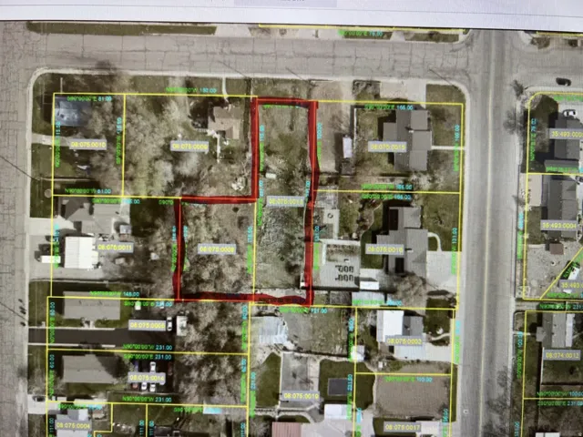 Aerial map of property and surrounding area featuring property parcel outlined