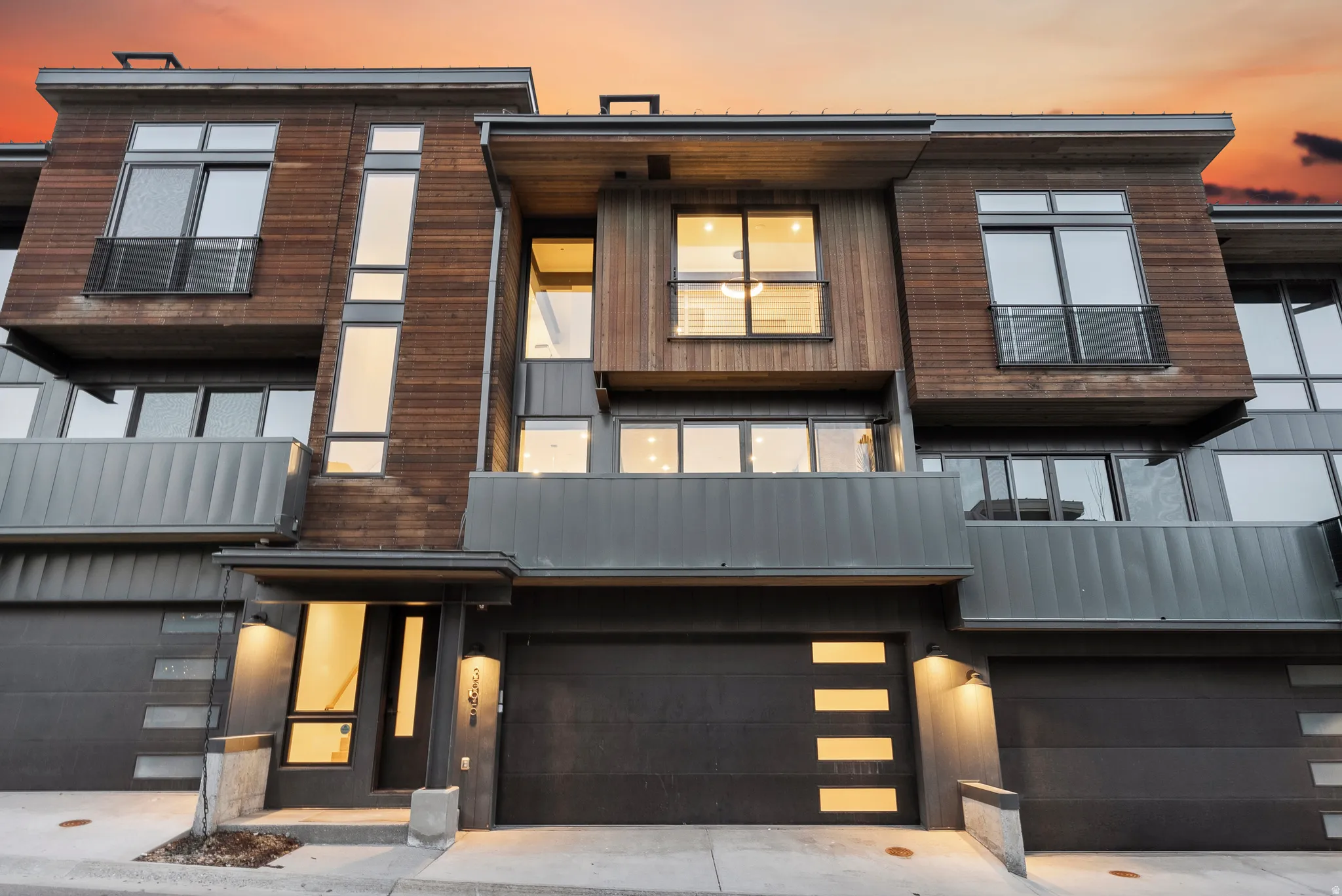 Contemporary home with a garage and driveway