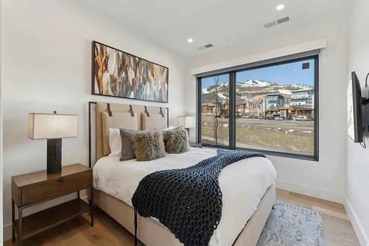 Bedroom featuring light wood-type flooring and recessed lighting