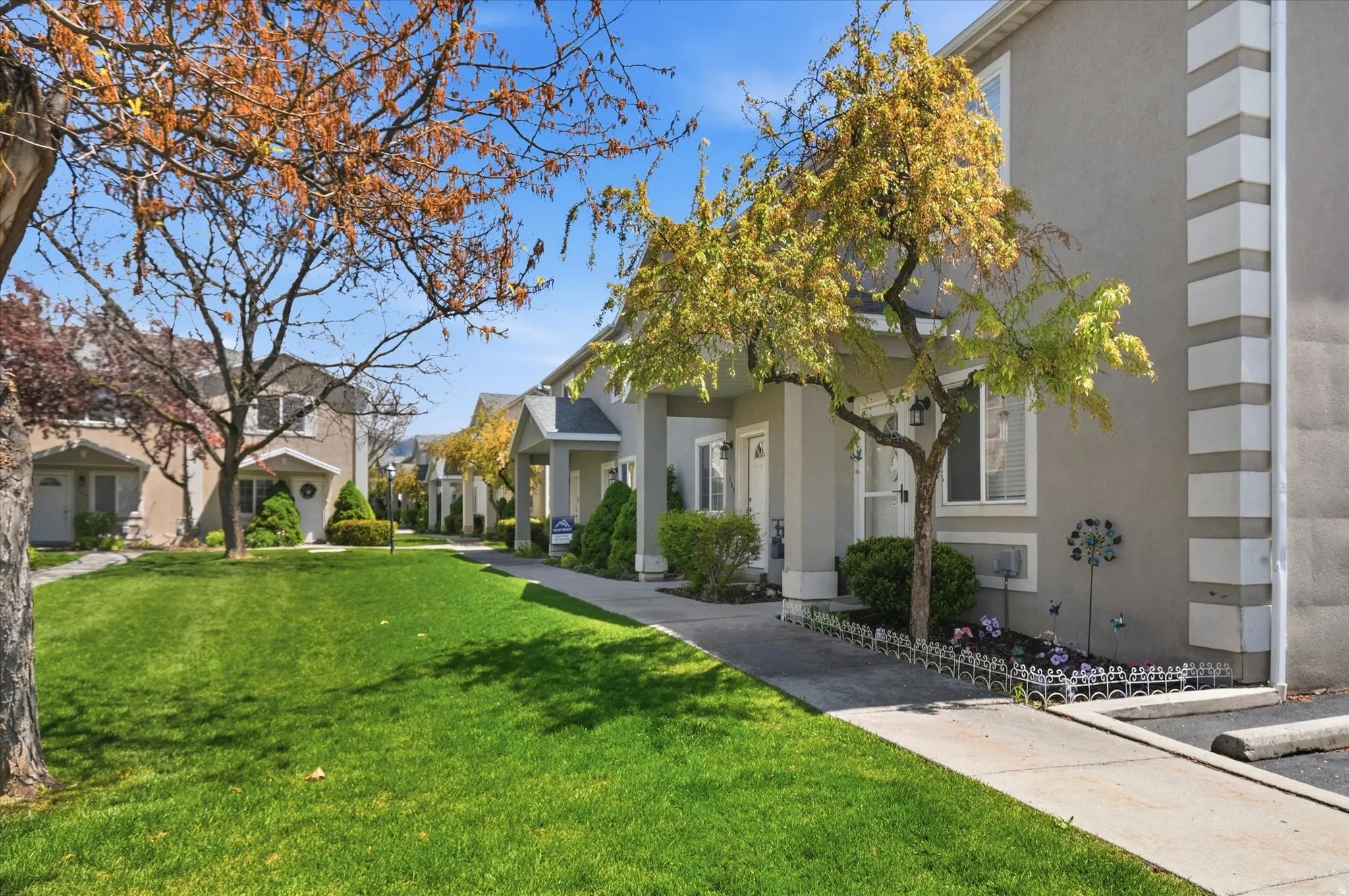 Exterior facade featuring a stucco finish with decorative corner quoins