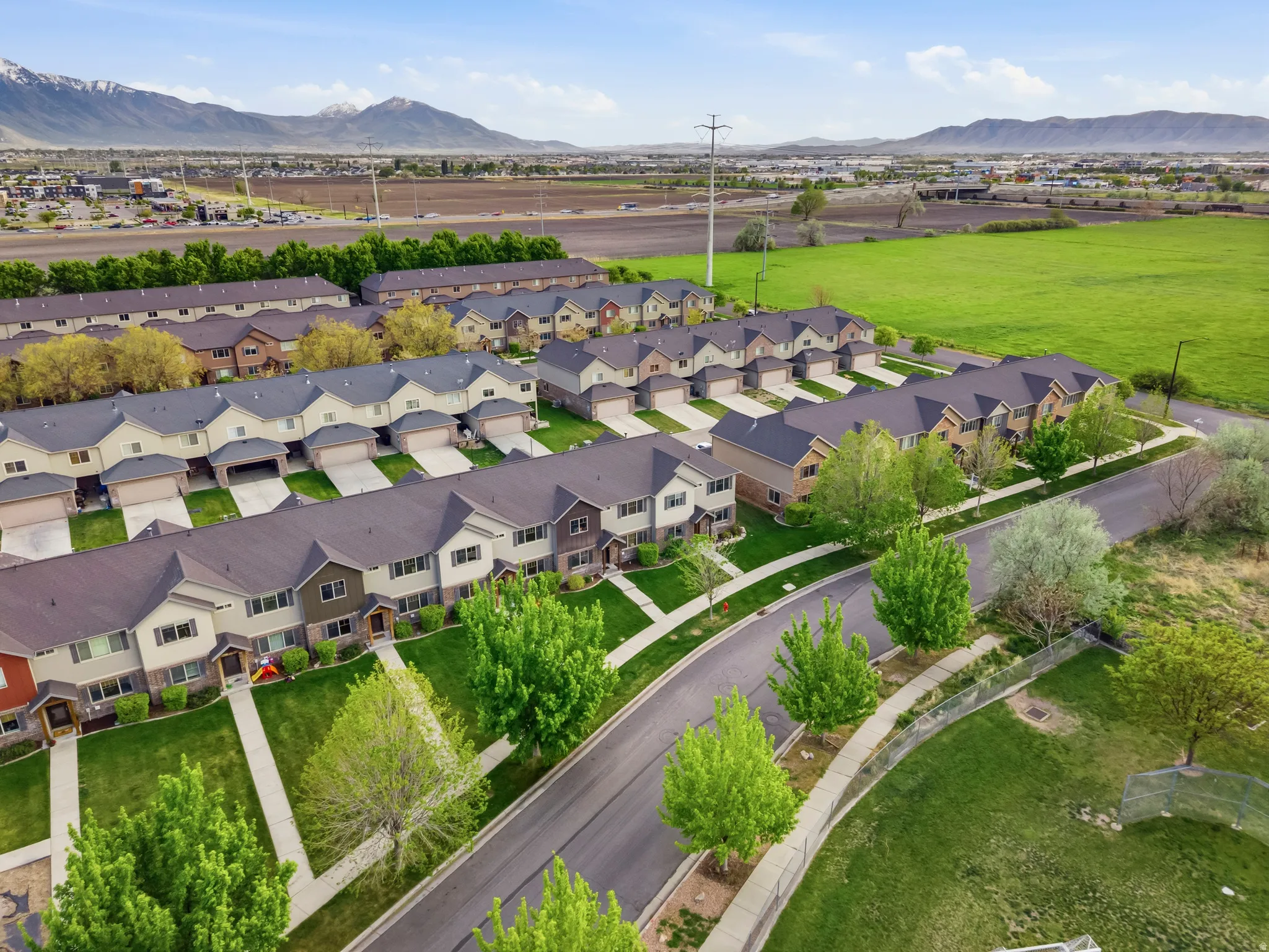 Aerial perspective of suburban area with mountains
