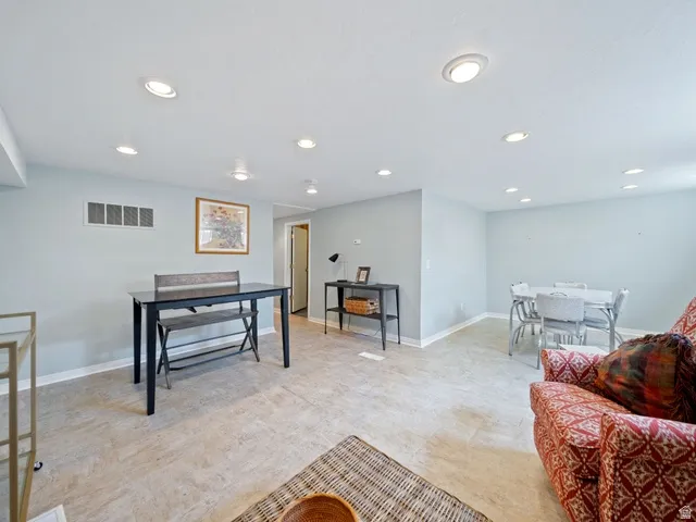 Family  room/flex  space with recessed lighting and baseboards