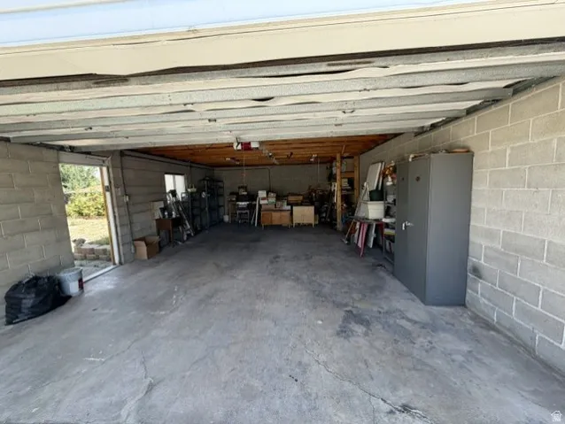 Extra deep garage with work bench. Tons of storage space.