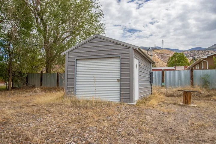 Garage featuring a mountain view