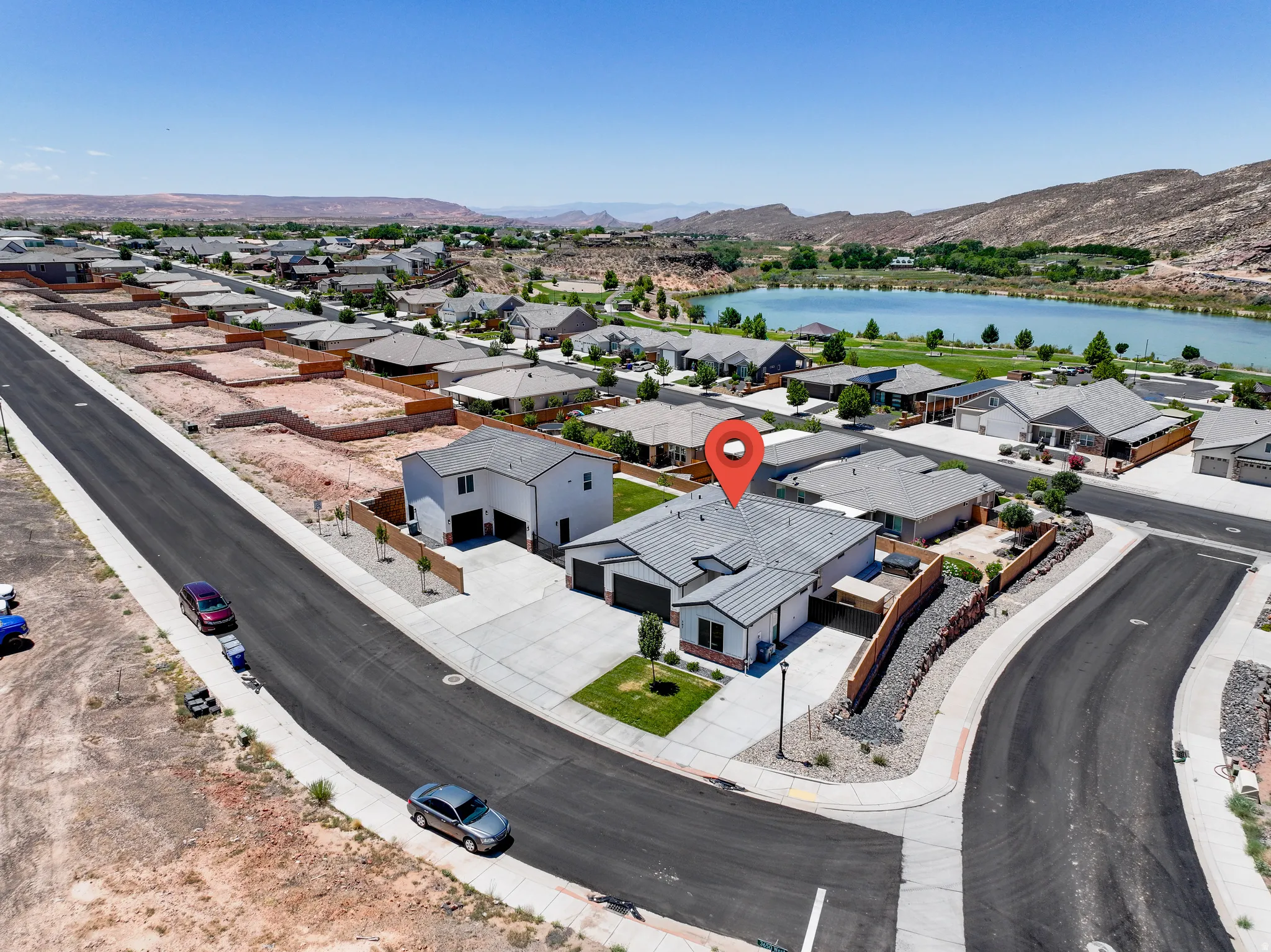 Aerial view of residential area with a water and mountain view