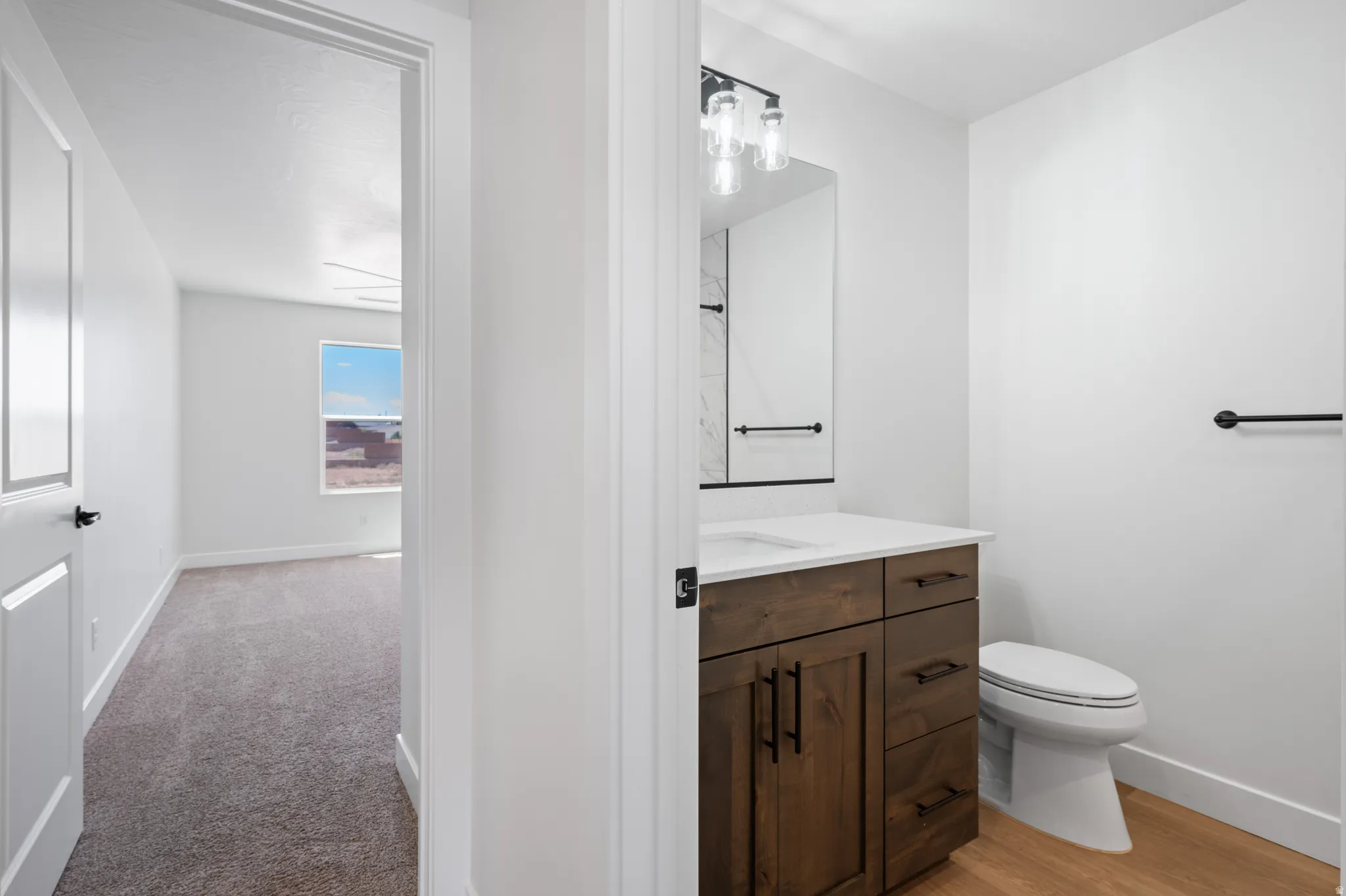 Bathroom with vanity and toilet