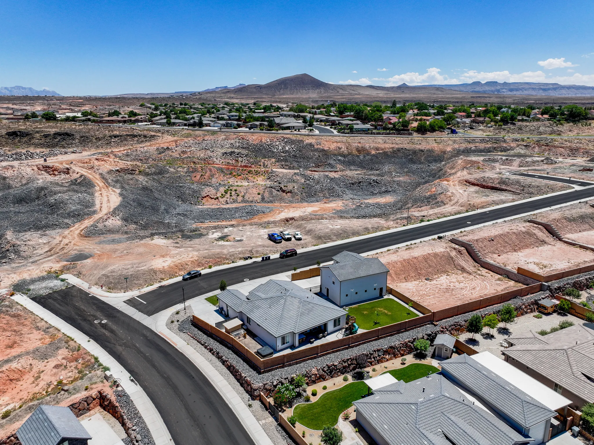 Aerial view of residential area with a mountainous background