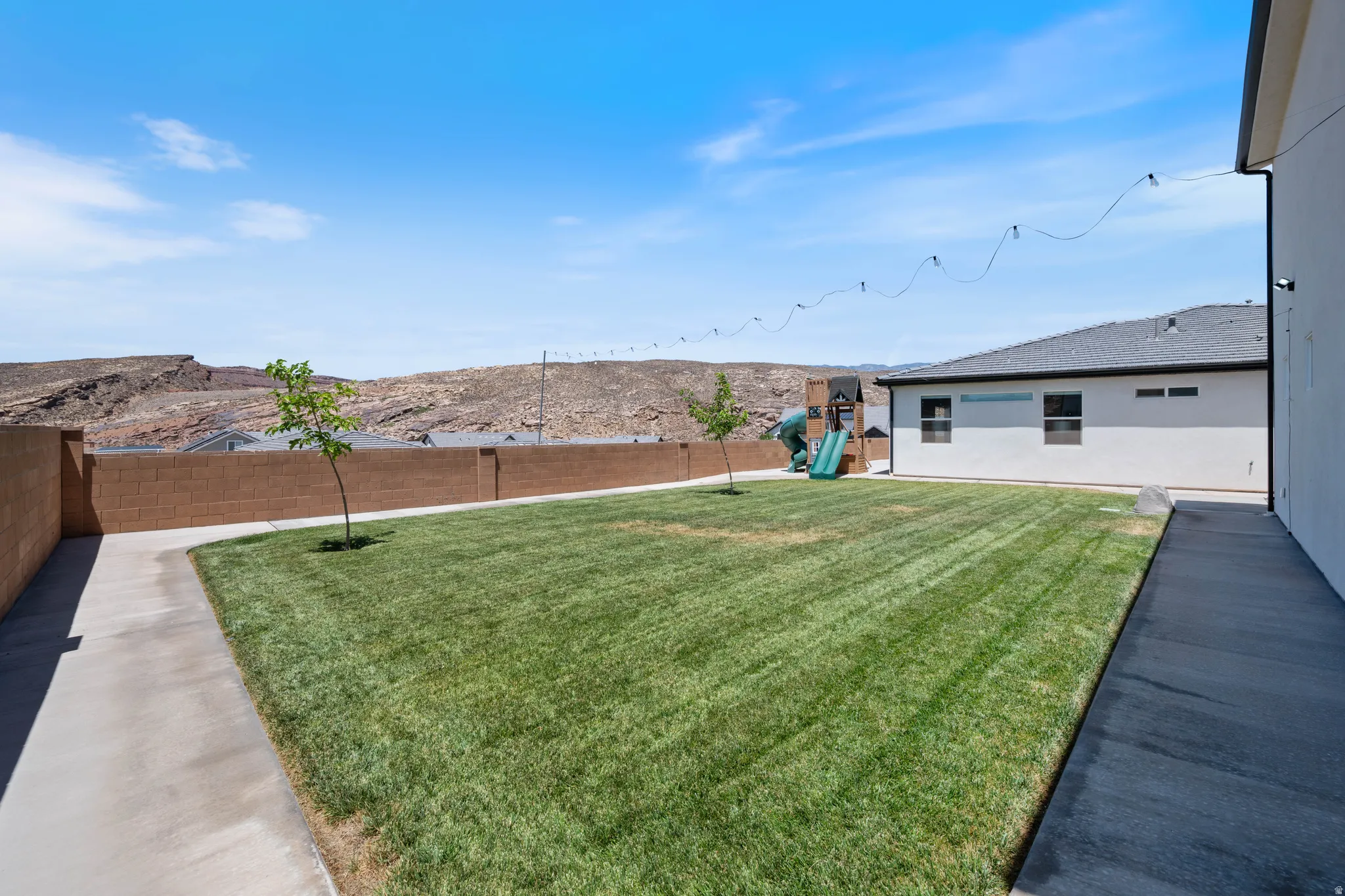 View of fenced backyard