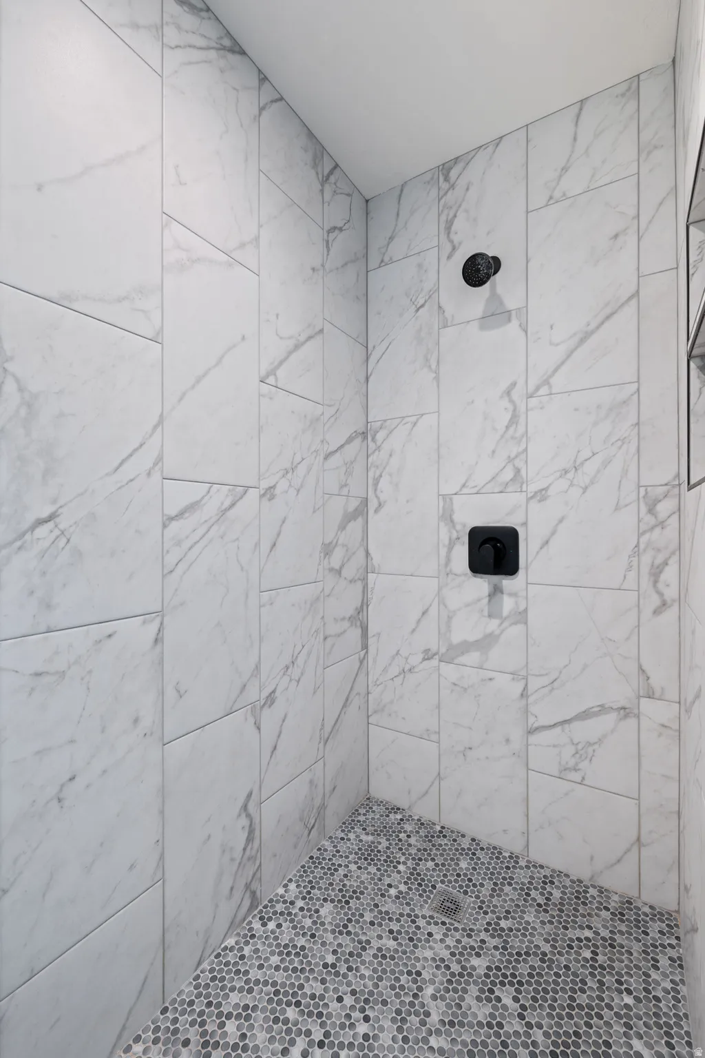 Bathroom with a tile shower