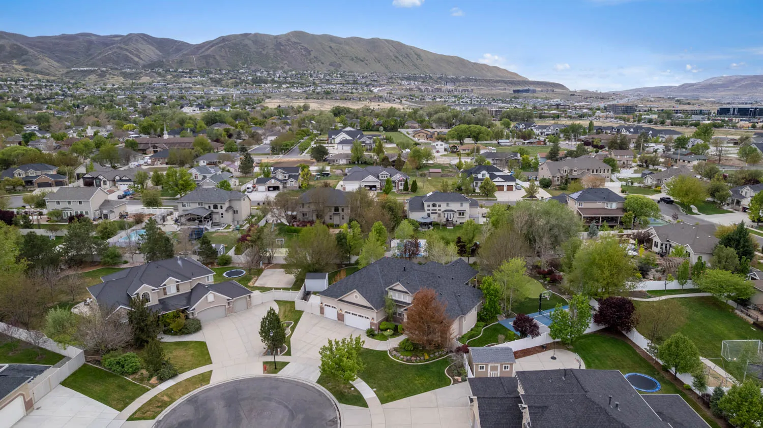 Aerial perspective of suburban area featuring mountains