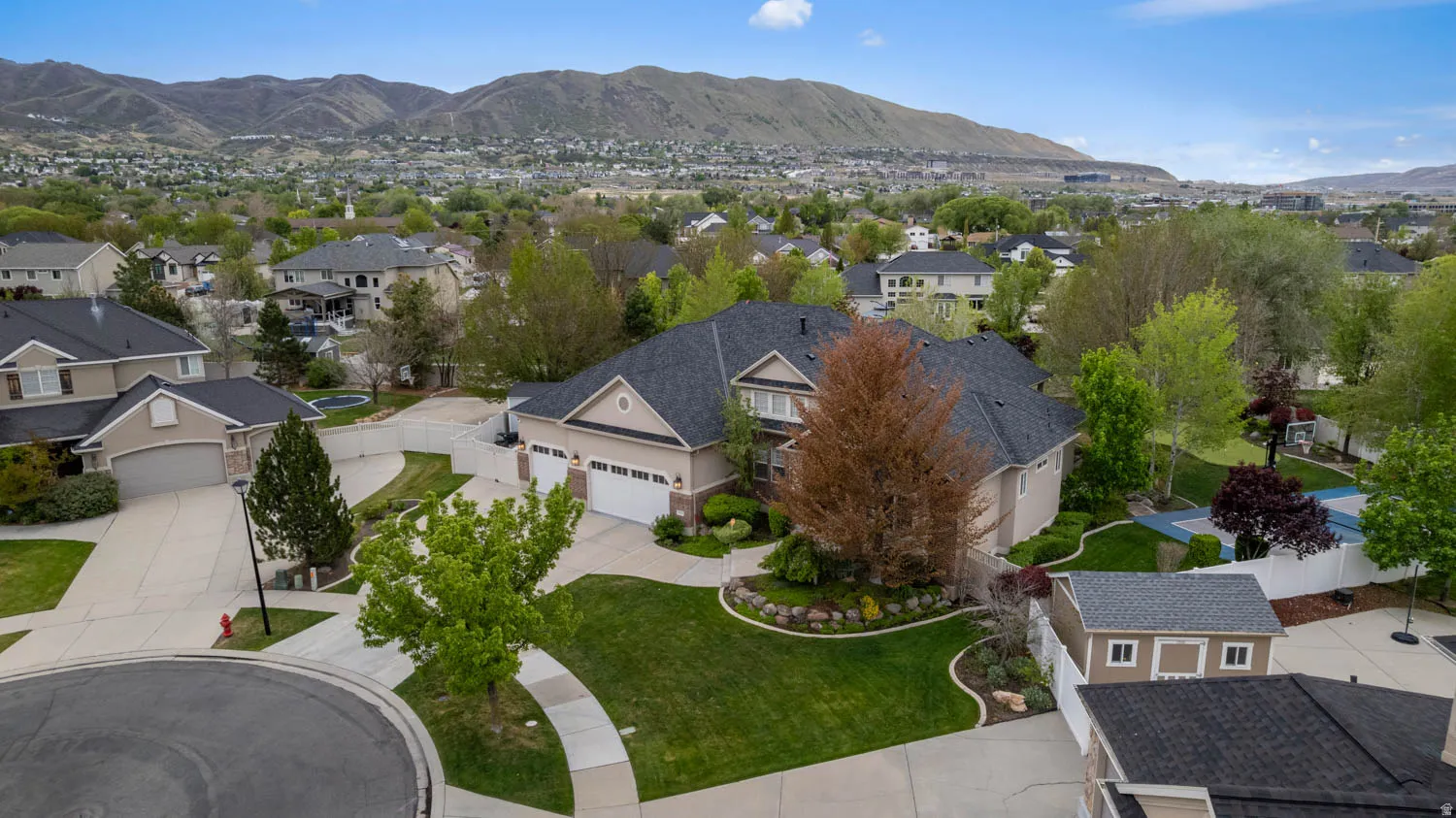 Aerial view of residential area with a mountain backdrop