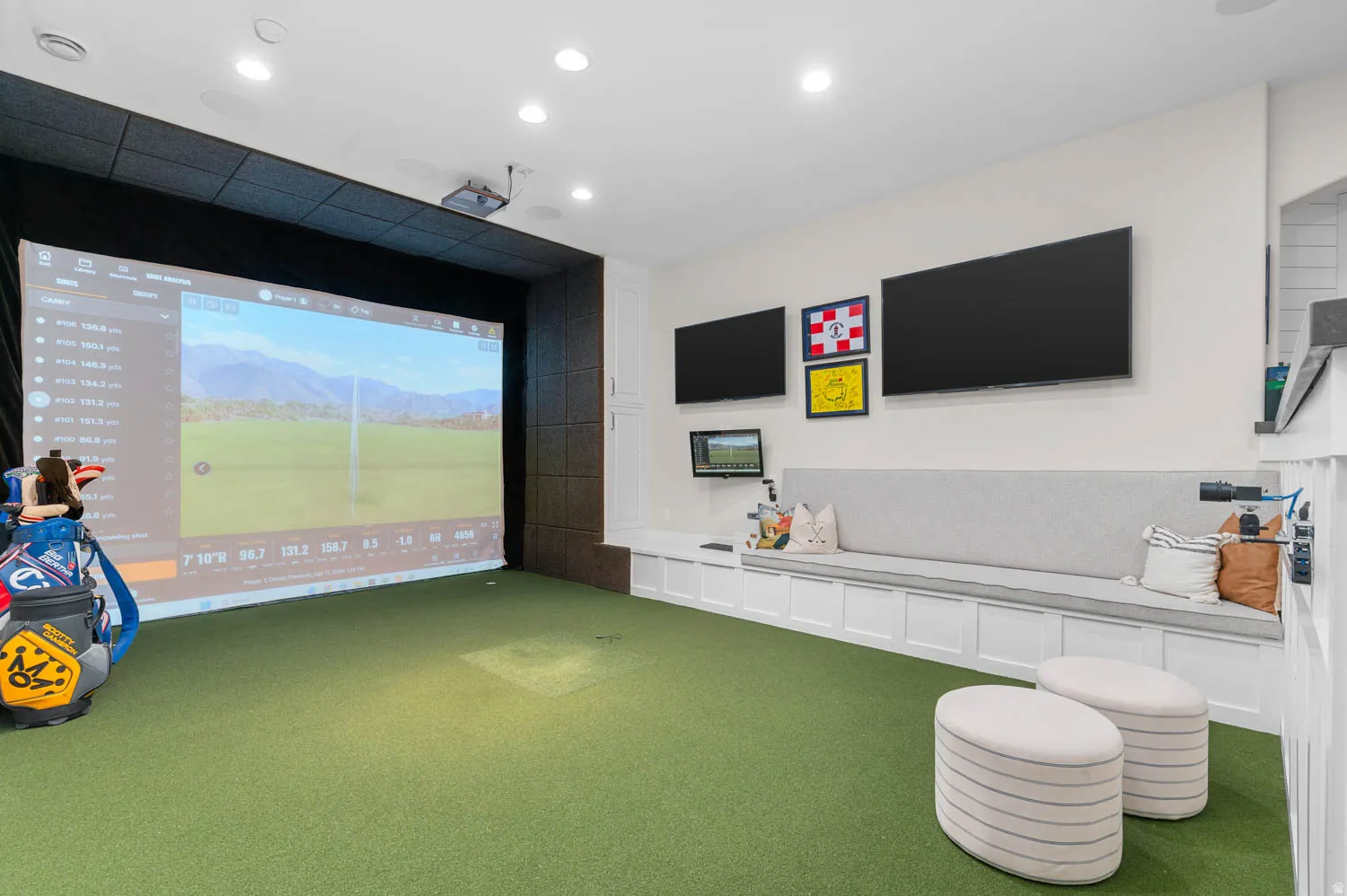 Recreation room with golf simulator