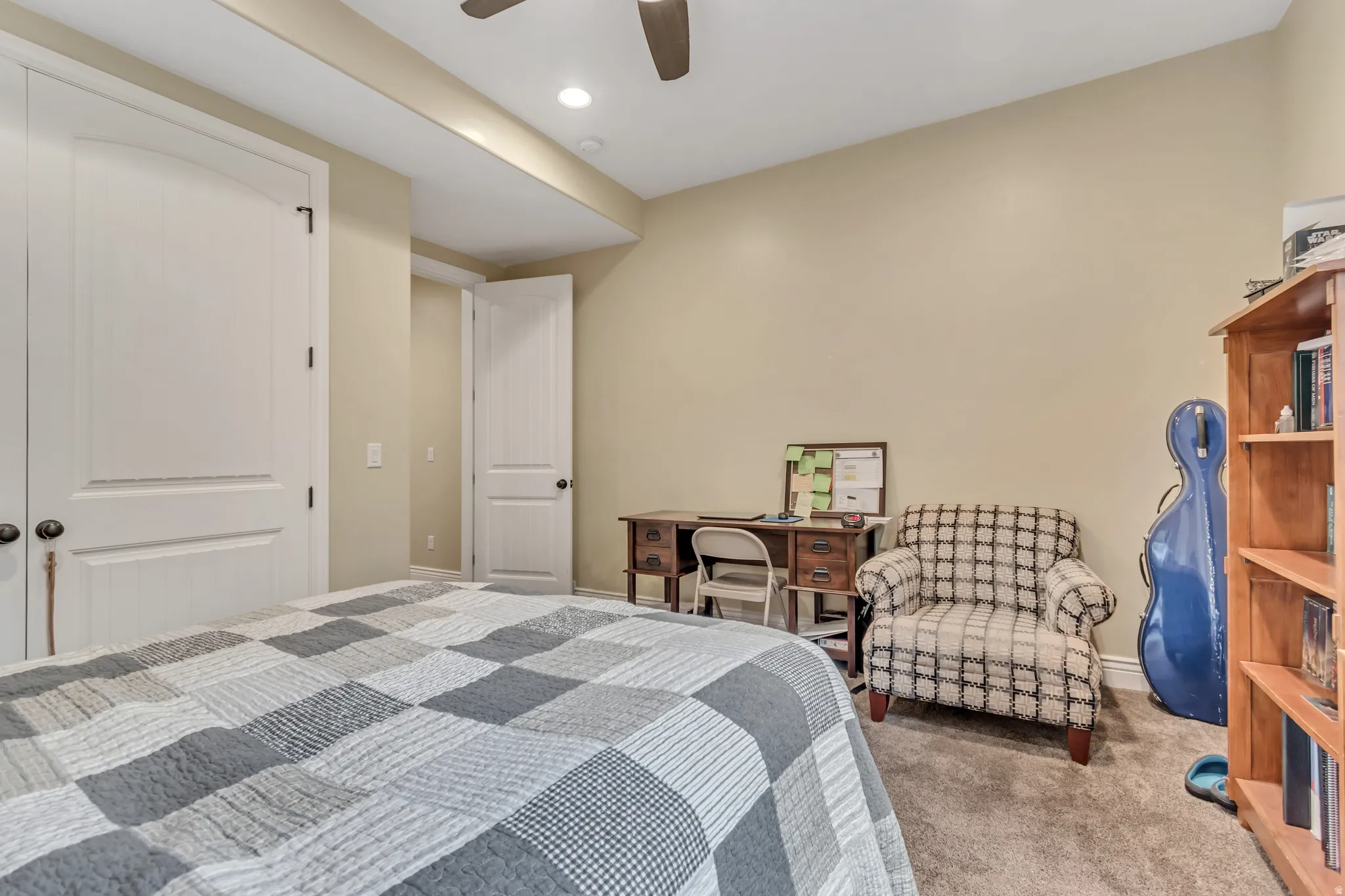 Bedroom with carpet flooring, ceiling fan, and recessed lighting