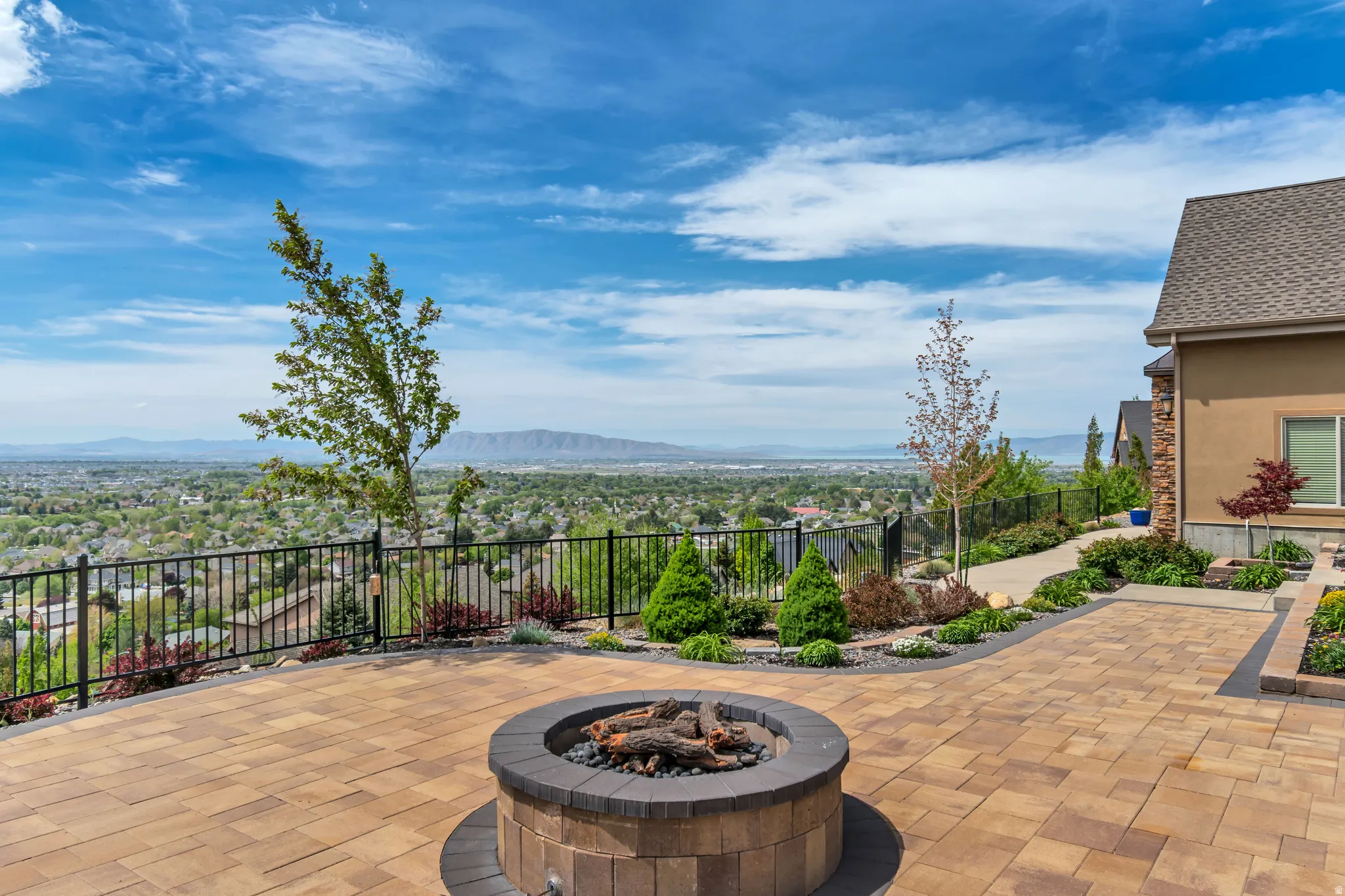 View of patio featuring a mountain view and a fire pit