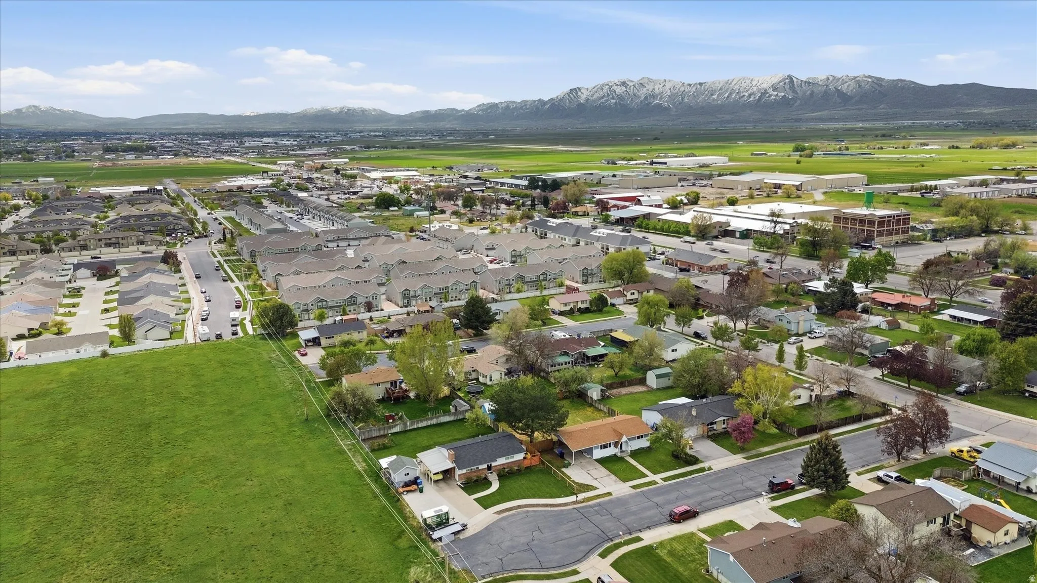 Aerial perspective of suburban area with mountains