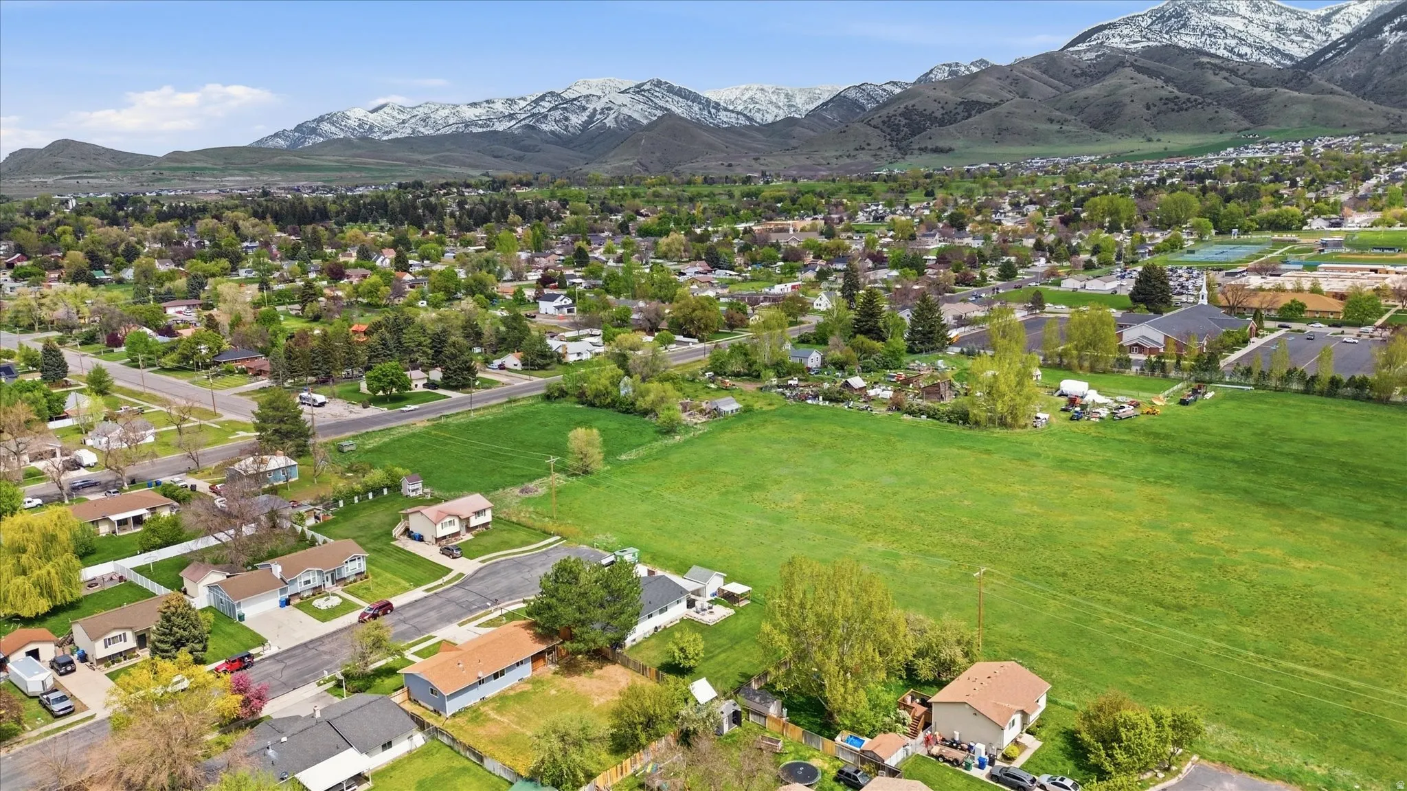Aerial view of residential area with a mountain backdrop