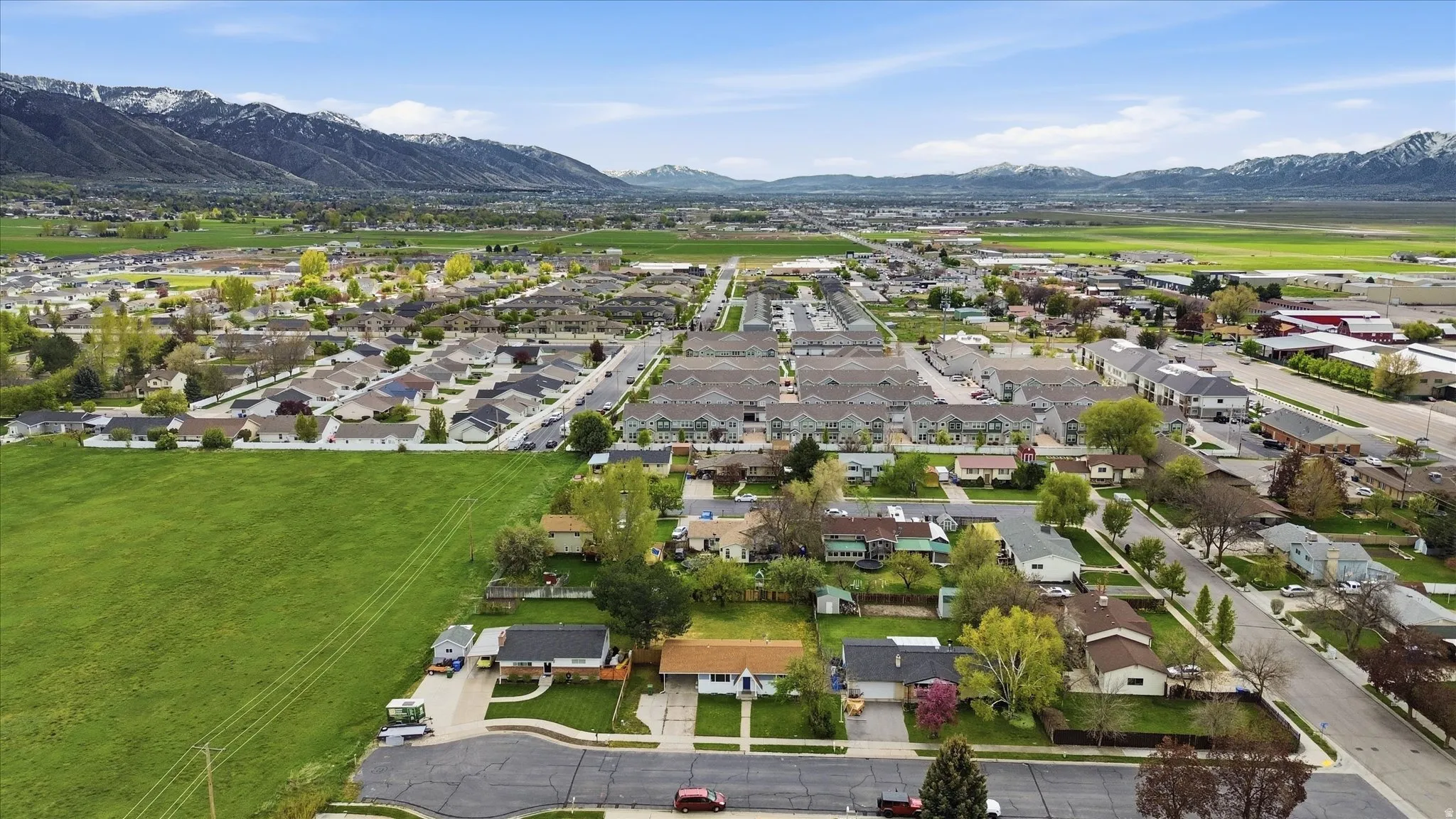 Aerial view of residential area with mountains