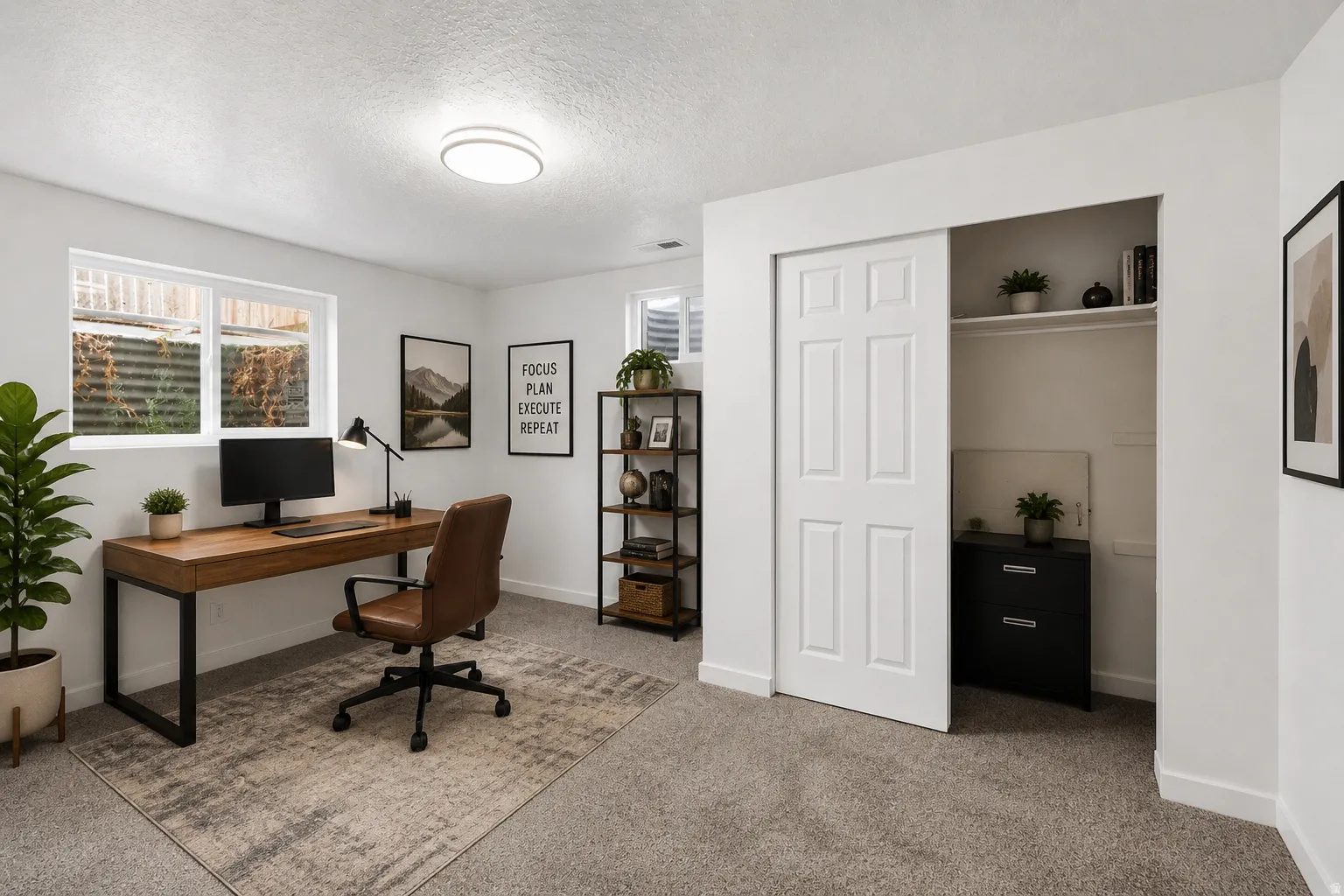 Bright room with neutral wall paint and light gray carpet flooring