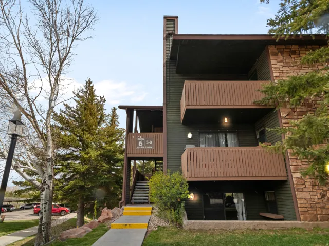 View of apartment building / complex featuring stairs