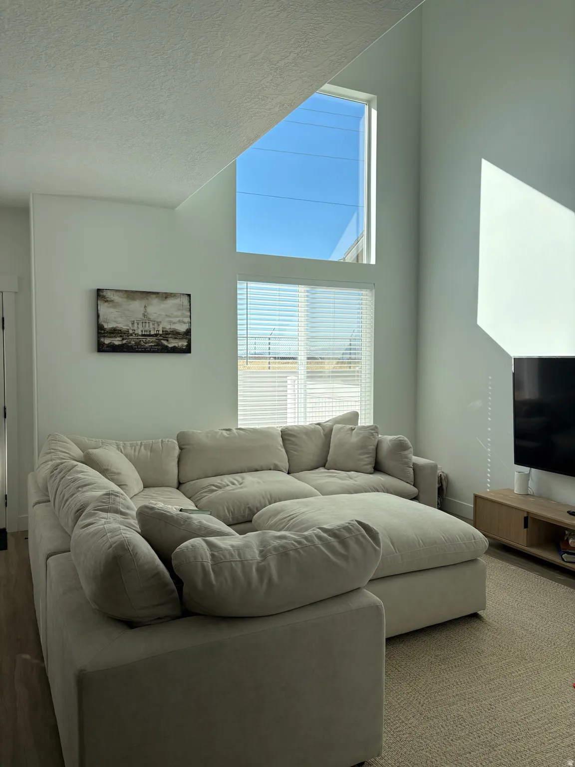 Living room featuring a textured ceiling