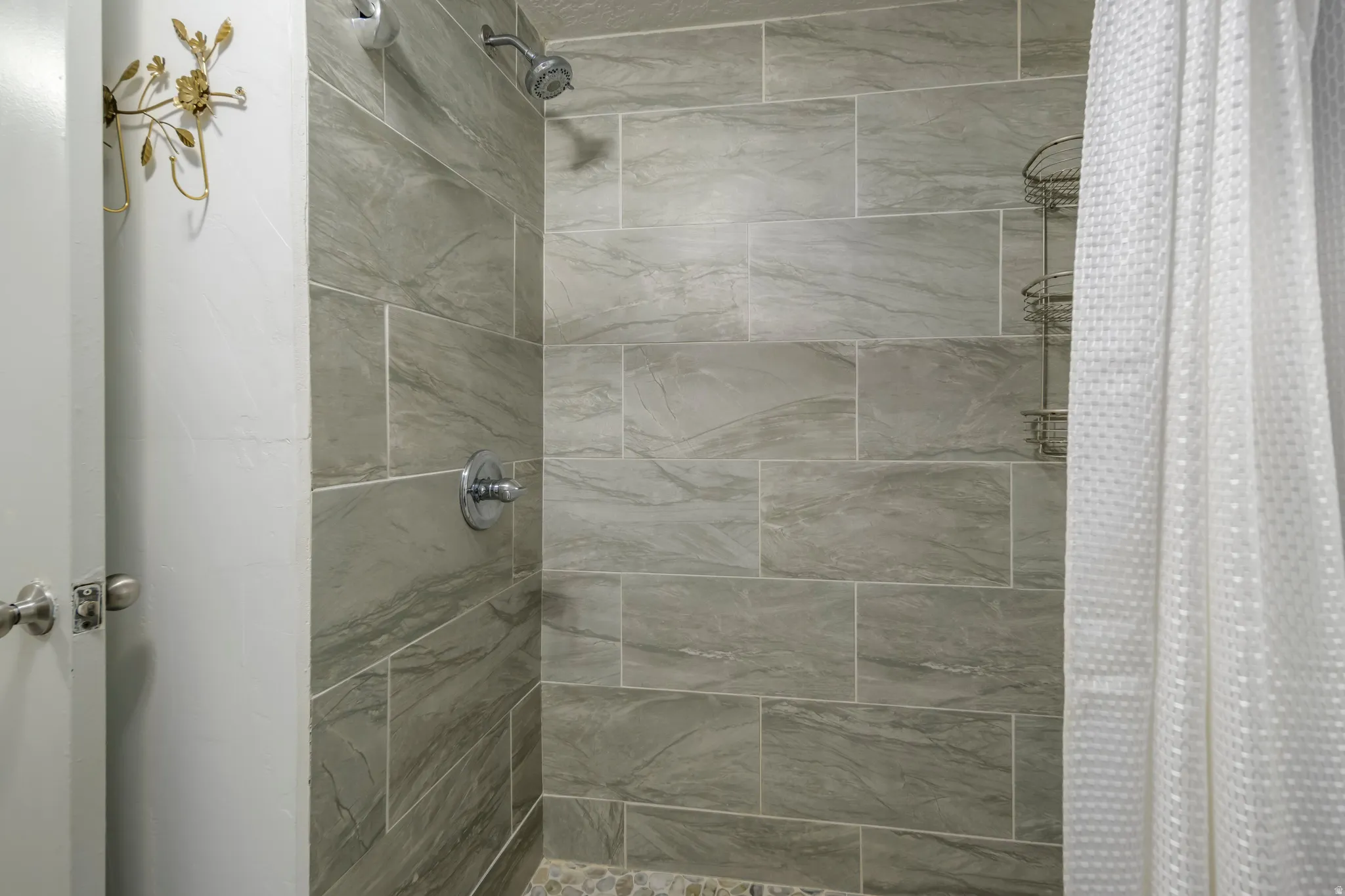 Full bath featuring a stall shower