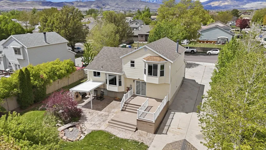 Aerial view of residential area featuring mountains