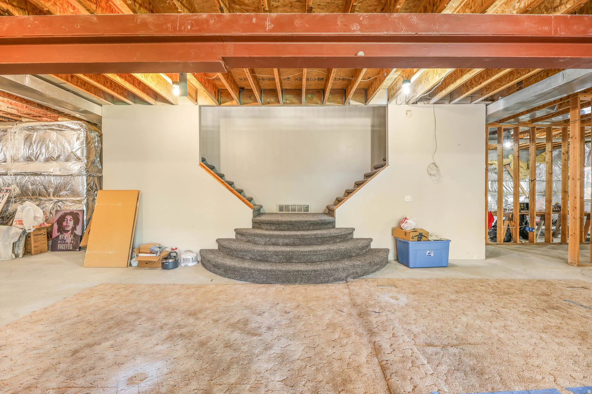Unfinished basement featuring stairs
