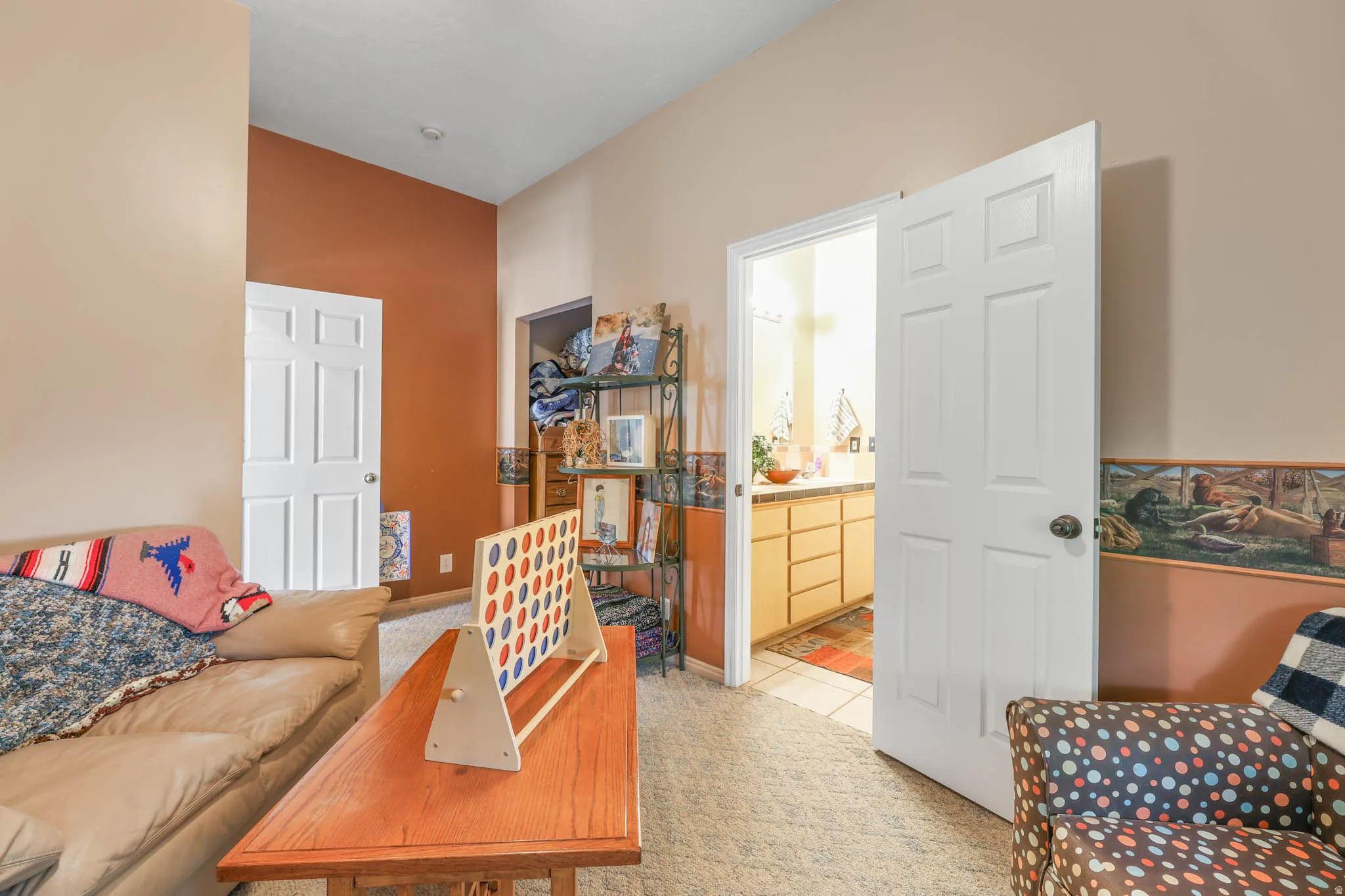 Living area with light carpet