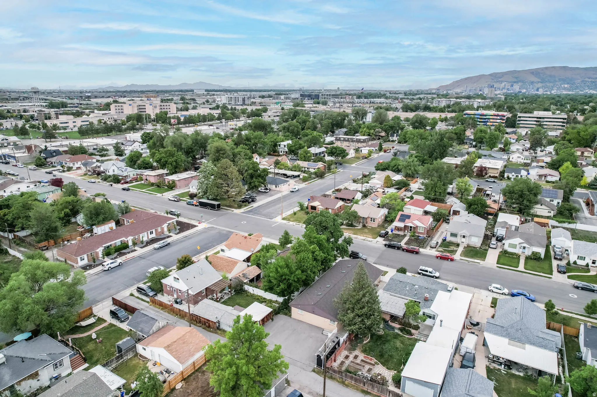 Aerial view of residential area with a mountainous background