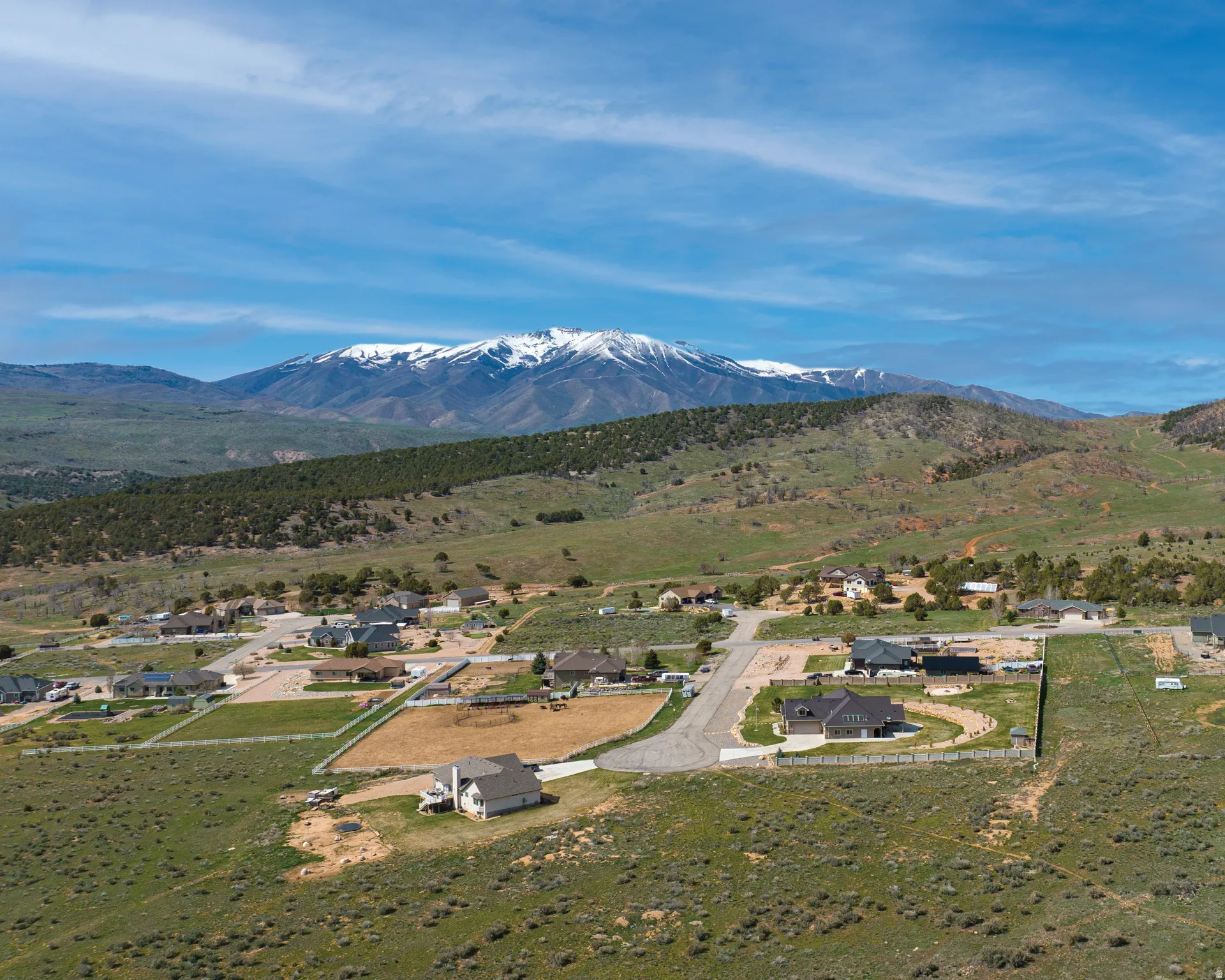 Aerial perspective of suburban area with mountains