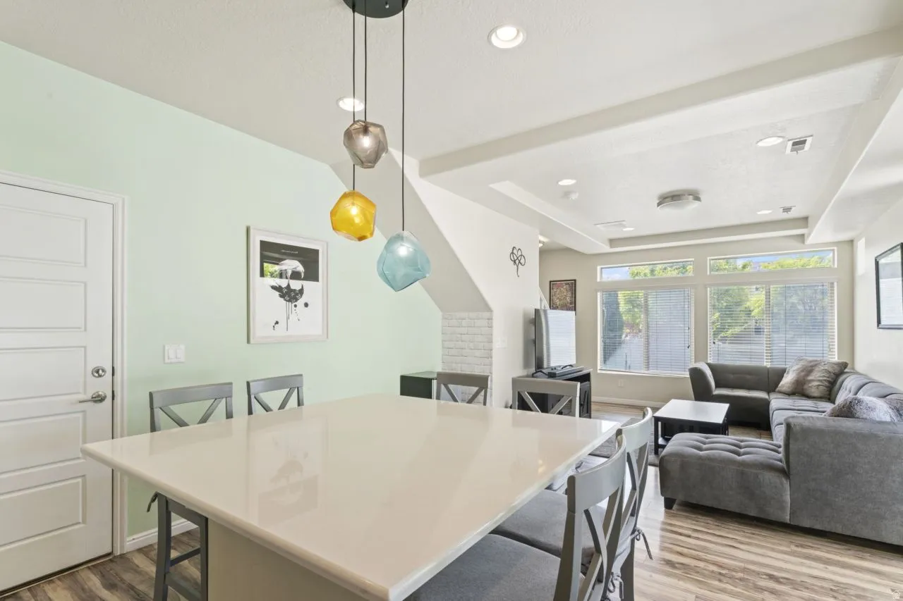 Dining space featuring light wood-style floors and recessed lighting