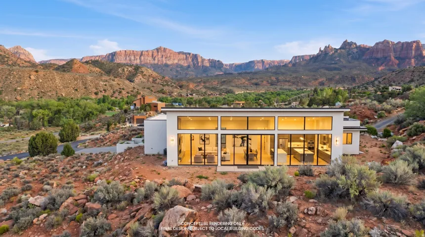 Rear view of property featuring a mountain view and stucco siding