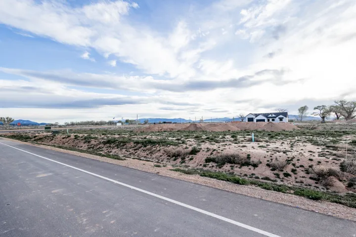 View of asphalt street with a mountain view