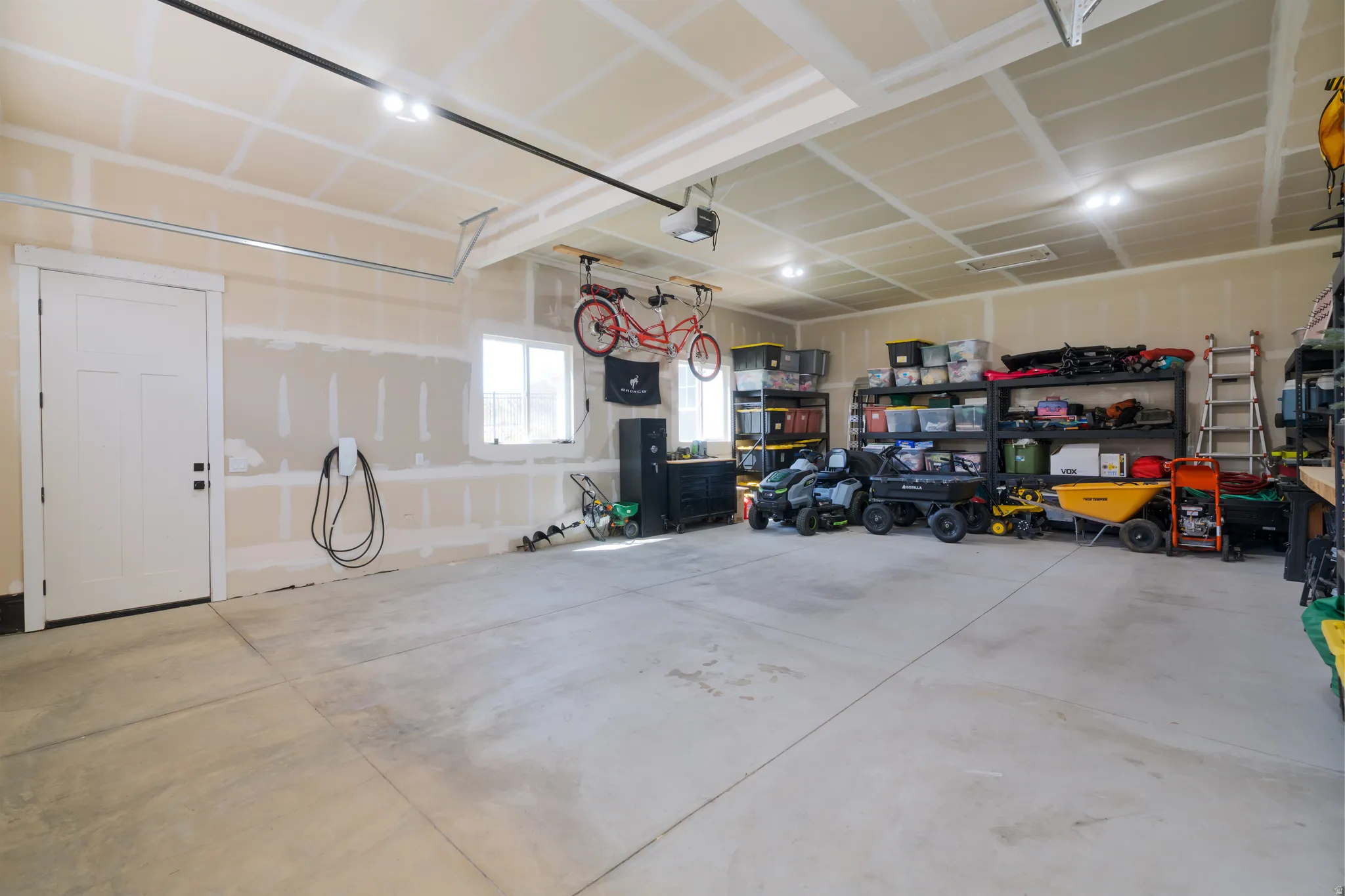 Garage featuring car charger