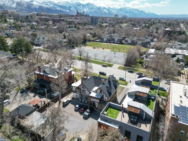 Aerial view of residential area featuring a mountain backdrop