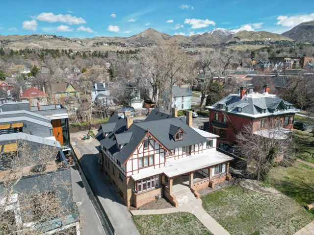 Aerial view of residential area with a mountain backdrop