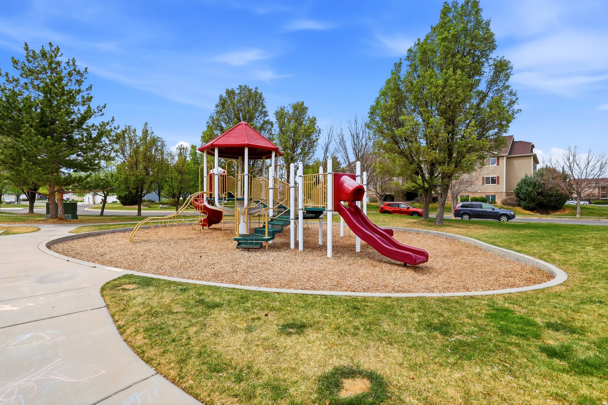 Community playground with a yard