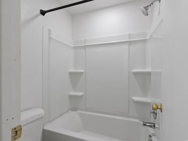 Bathroom featuring shower / bath combination