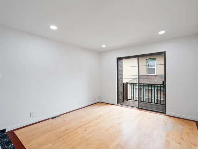 Unfurnished room featuring light wood-style flooring and recessed lighting
