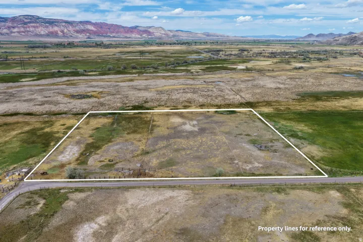 View of rural area with property parcel outlined and mountains