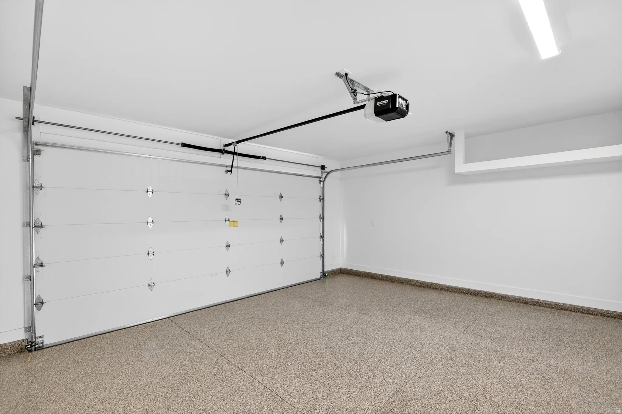 Built in overhead storage and Epoxy floors