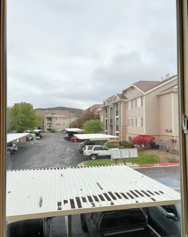 Uncovered parking lot with a residential view