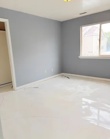 Empty room with baseboards