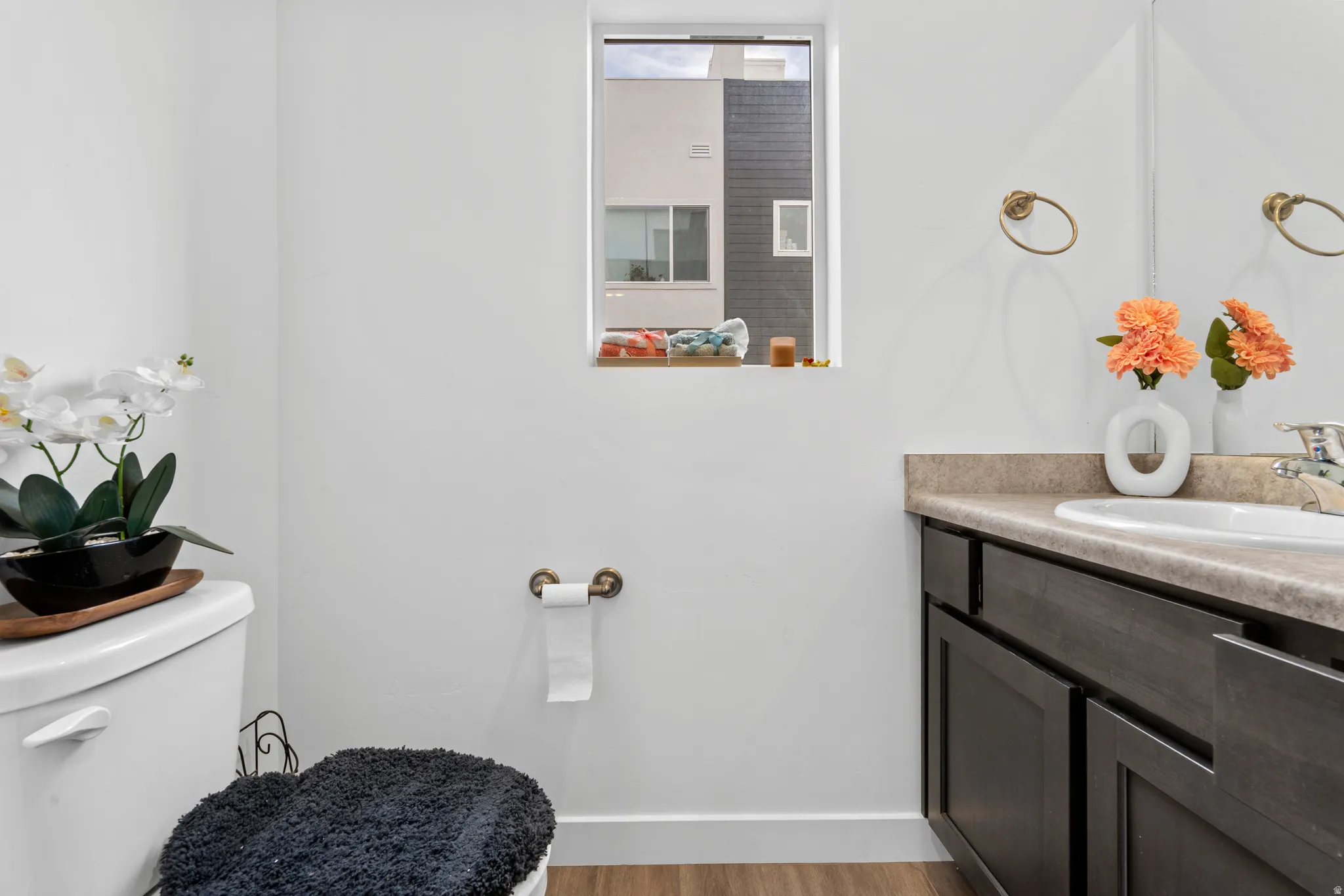 Bathroom featuring vanity and light wood-type flooring