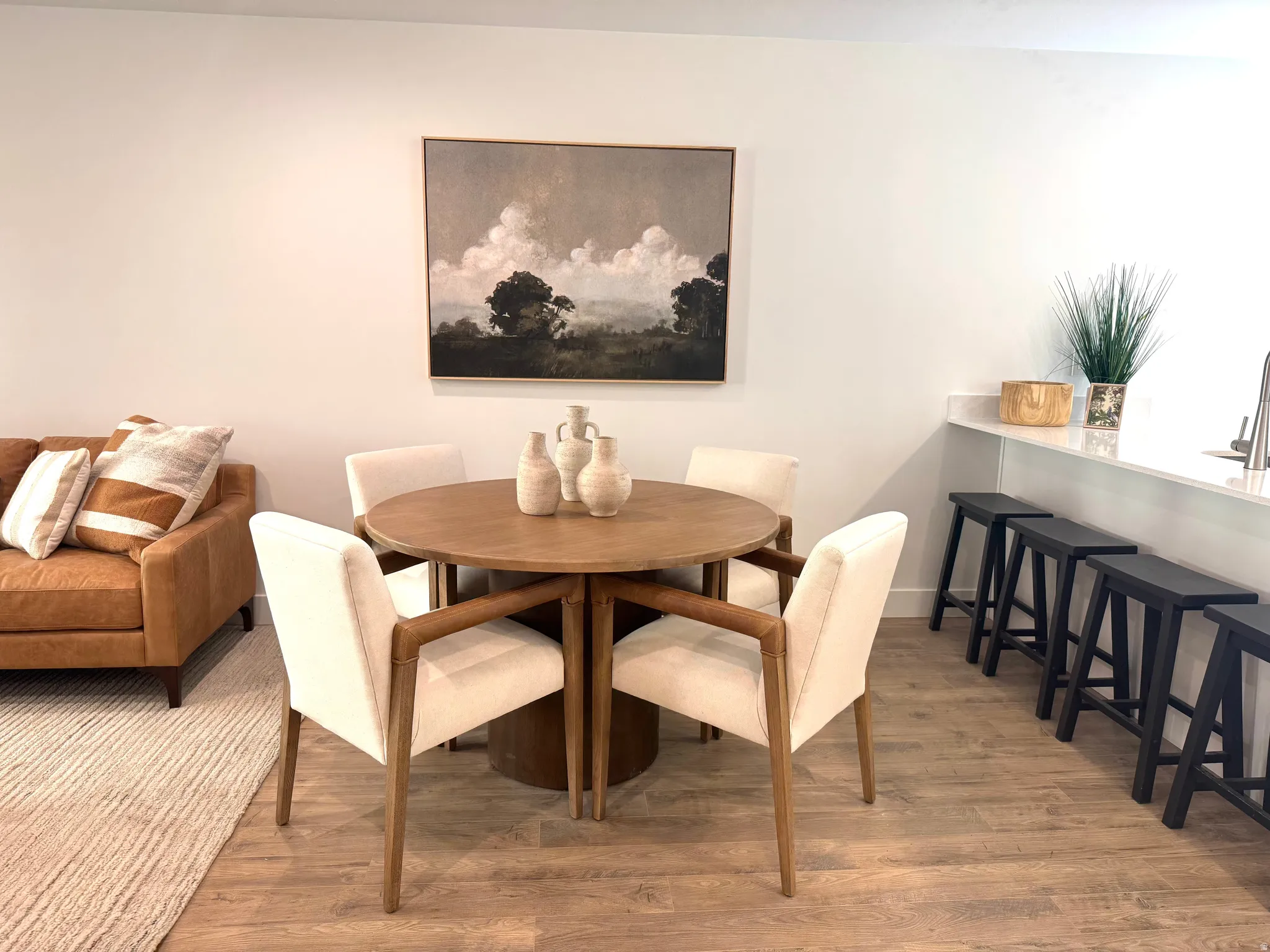 Dining area featuring light wood finished floors and baseboards