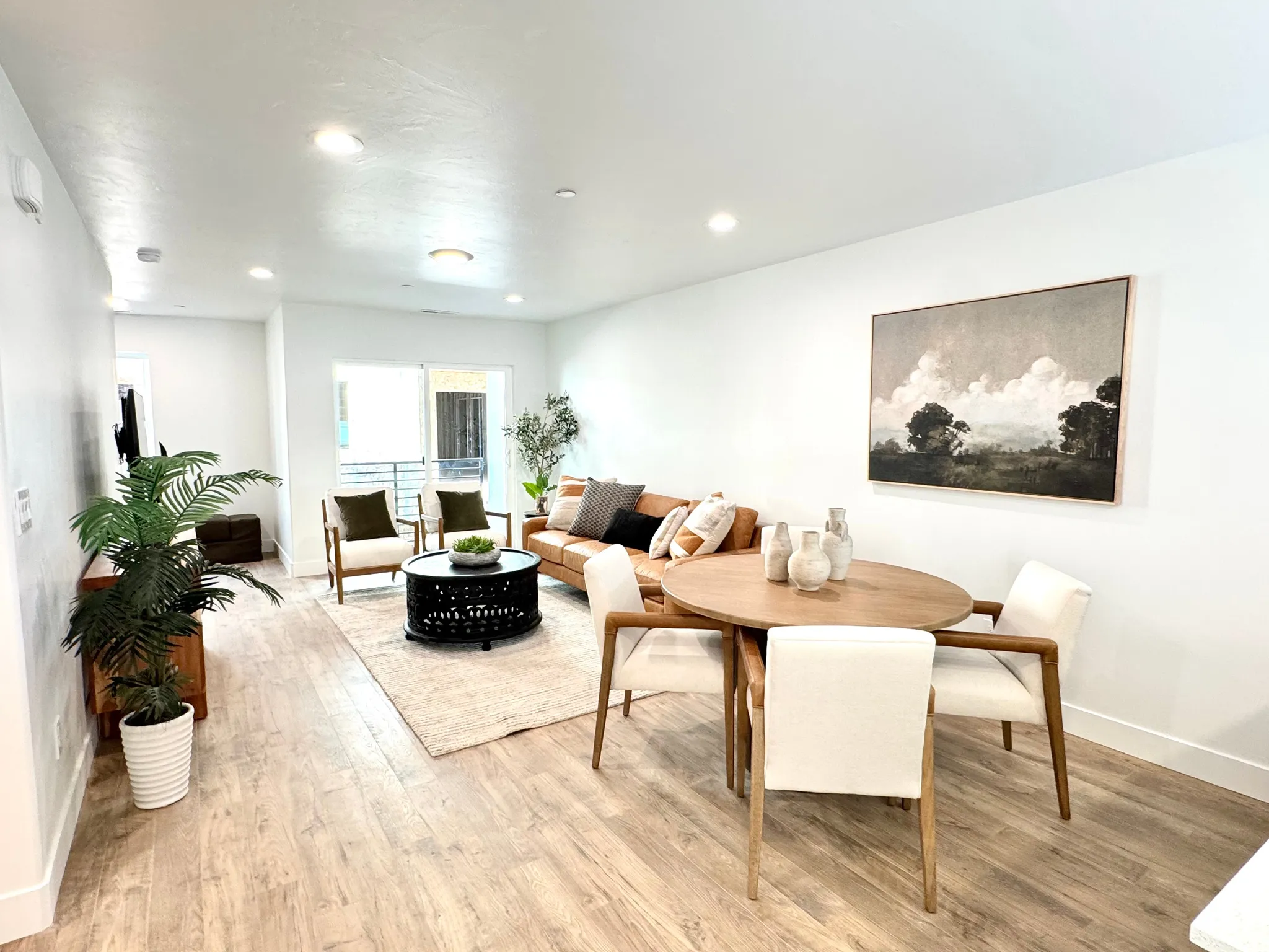 Dining room featuring light wood finished floors and recessed lighting